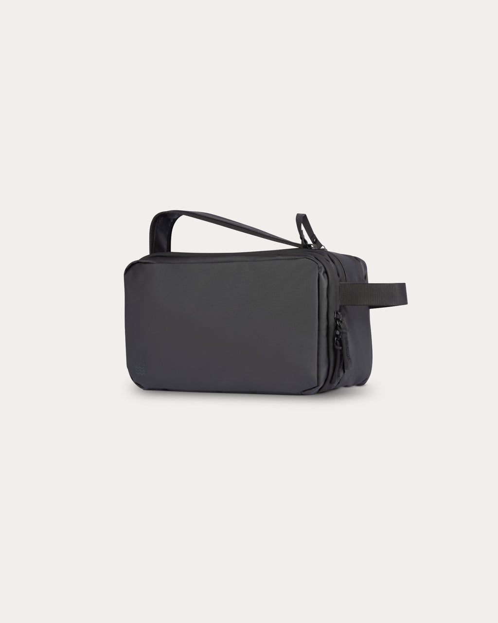 Trousse de toilette de voyage noire avec poignées, vue en trois quarts